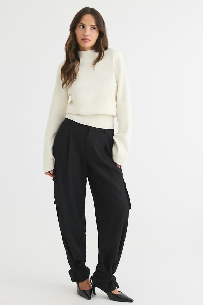 Knitted shoulder pad top